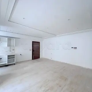 Appartement S+1 avec balcon dans une résidence avec piscine