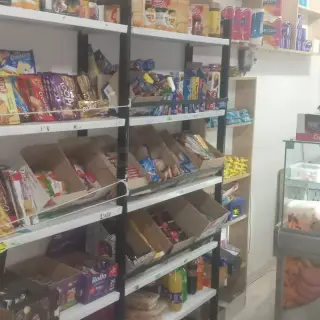 Fonds de commerce d'alimentation générale en activité, rue principale — photo 4