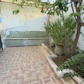 Triplex avec jardin et grande terrasse en résidence fermée à El Menzah 9 — photo 3