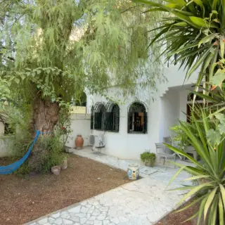 Triplex avec jardin et grande terrasse en résidence fermée à El Menzah 9 — photo 4