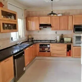 Duplex S+4 avec terrasse, jardin et garage à Radès Méliane