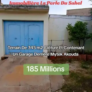 TERRAIN CLOTURÉ CONTENANT UN GARAGE DERRIÉRE MYTEK AKOUDA 