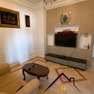Un appartement s+3 rdc avec parking sous sol 