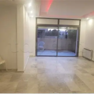 À Vendre – Appartement S+2 avec jardin et parking