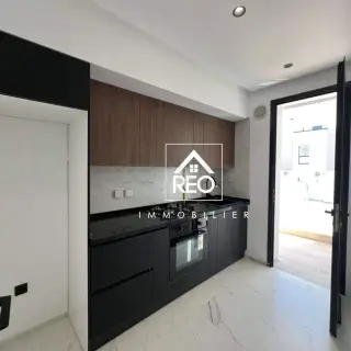 Appartement S+2 neuf avec balcon et parking en sous-sol, La Nouvelle Soukra